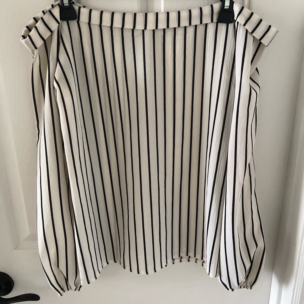 Woman’s black/white striped off shoulder blouse
